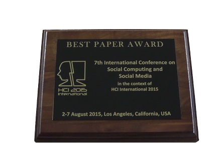 Social Computing and Social Media Best Paper Award. Details in text following the image.